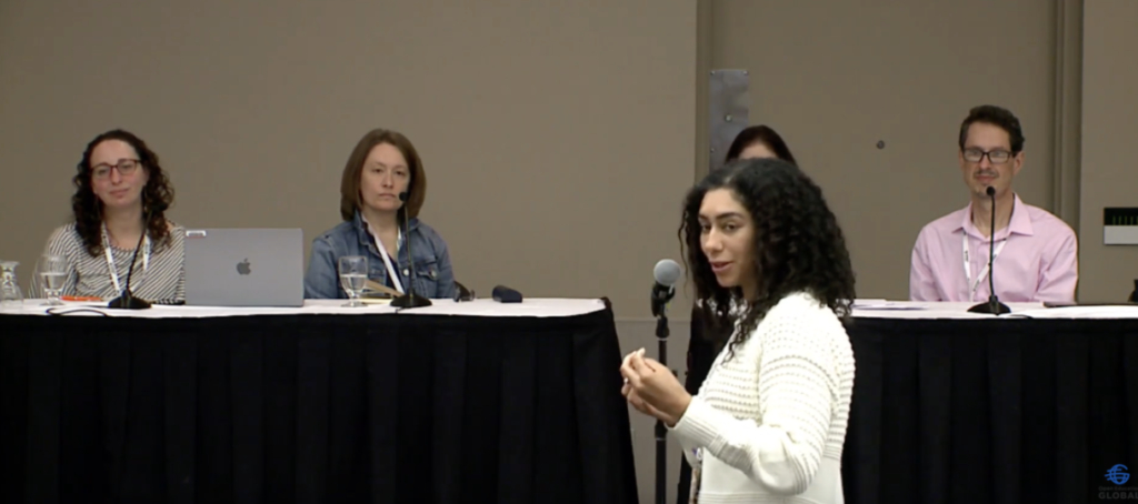 Joy Shoemate (College of the Canyons) discusses the Exploring OER & Open Pedagogy course during our panel discussion at OEGlobal 2023. (Image courtesy by OEGlobal on YouTube)